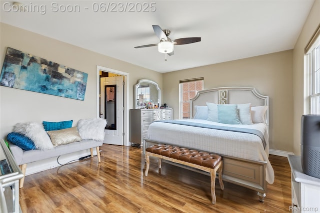 750 2nd St Unit 27, Wyandotte, MI 48192 - bedroom with wood finished floors and ceiling fan
