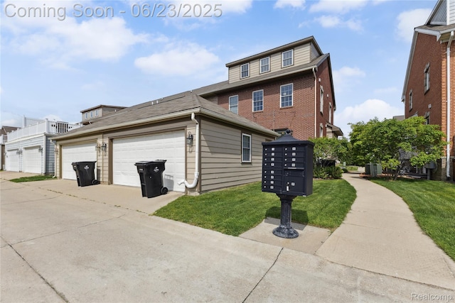750 2nd St Unit 27, Wyandotte, MI 48192 - view of front of home featuring a front lawn and driveway