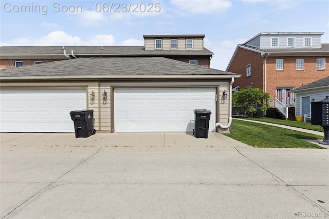 750 2nd St Unit 27, Wyandotte, MI 48192 - garage featuring concrete driveway