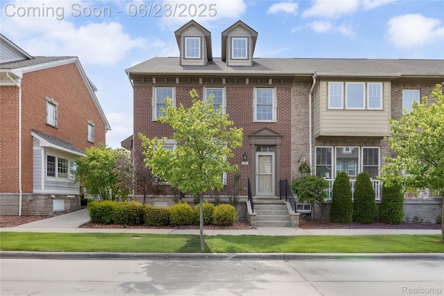 750 2nd St Unit 27, Wyandotte, MI 48192 - view of front facade with brick siding