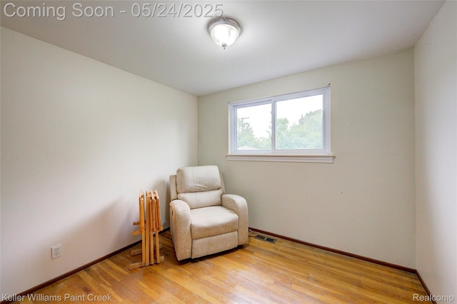 3637 Dawson Dr, Warren, MI 48092 - living area featuring light wood-style floors and baseboards