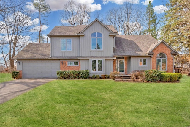 37695 Burton Dr, Farmington Hills, MI 48331 - view of front of house featuring board and batten siding, driveway, a garage, and a front lawn