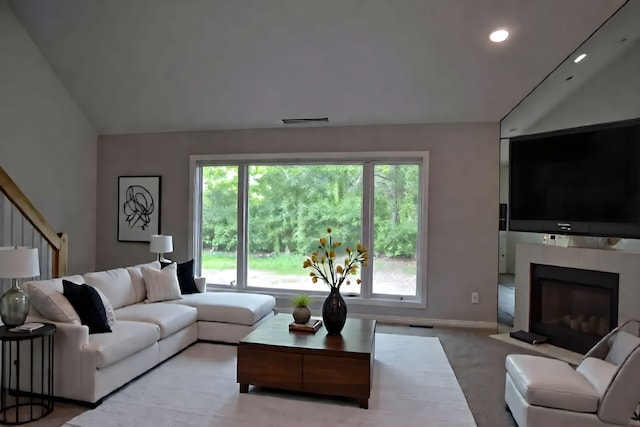 37695 Burton Dr, Farmington Hills, MI 48331 - living area with lofted ceiling, a fireplace with flush hearth, recessed lighting, and baseboards