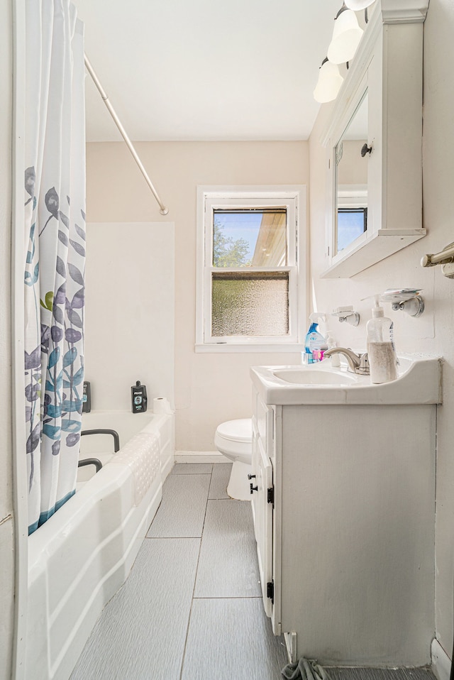 8468 Jewett Ave, Warren, MI 48089 - full bathroom featuring vanity, shower / tub combo, toilet, baseboards, and tile patterned floors