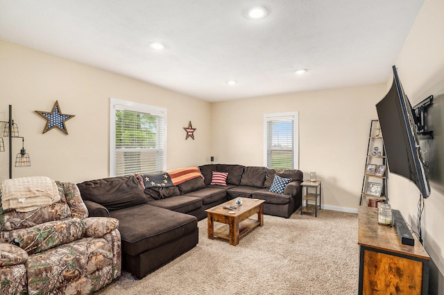 7917 E Harrison Rd, Breckenridge, MI 48615 - living area featuring light colored carpet, recessed lighting, and baseboards