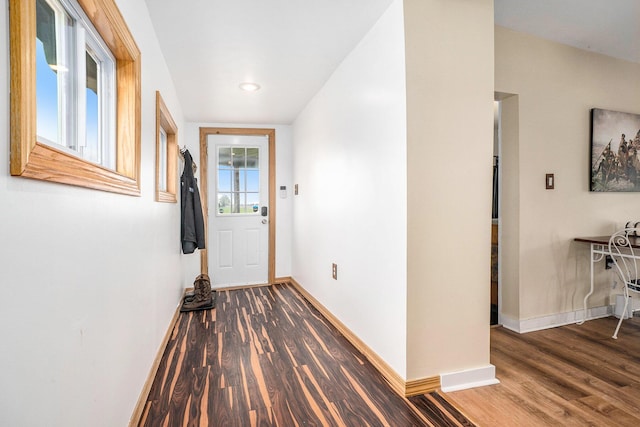 7917 E Harrison Rd, Breckenridge, MI 48615 - doorway with wood finished floors, baseboards, and recessed lighting