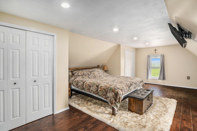 7917 E Harrison Rd, Breckenridge, MI 48615 - bedroom featuring wood-type flooring, recessed lighting, baseboards, and lofted ceiling
