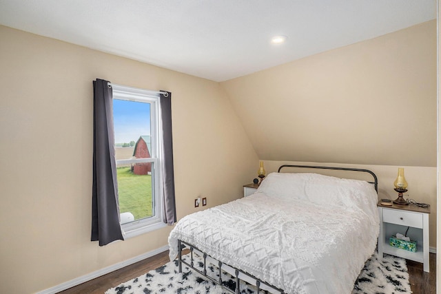 7917 E Harrison Rd, Breckenridge, MI 48615 - bedroom featuring baseboards, wood finished floors, and recessed lighting