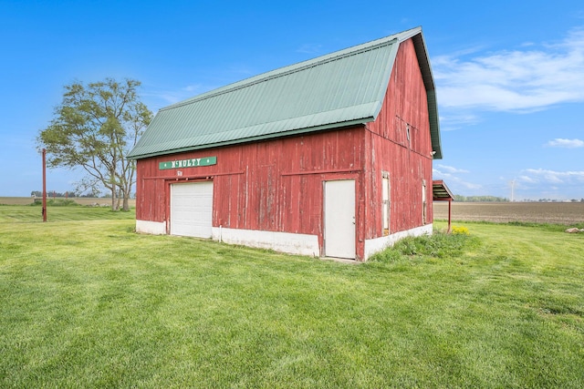 7917 E Harrison Rd, Breckenridge, MI 48615 - view of barn with a lawn