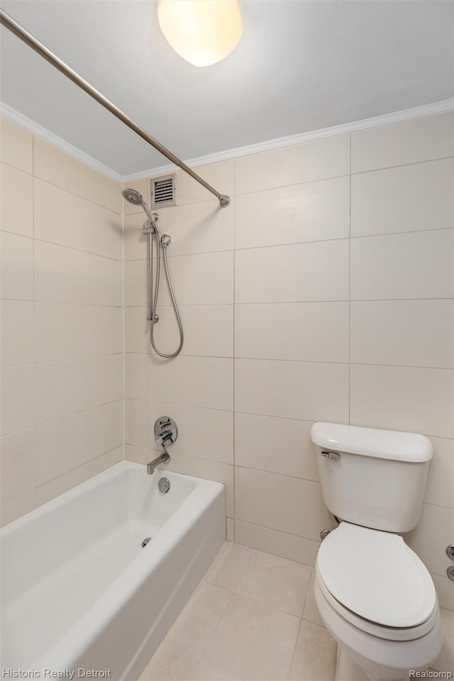 1300 E Lafayette St Unit 2502, Detroit, MI 48207 - full bathroom with shower / washtub combination, tile patterned floors, toilet, tile walls, and crown molding