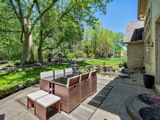 62887 Tournament Dr, Washington, MI 48094 - view of patio / terrace featuring outdoor dining area