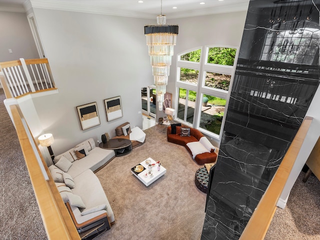 62887 Tournament Dr, Washington, MI 48094 - living area with recessed lighting, a chandelier, ornamental molding, a high ceiling, and stairway