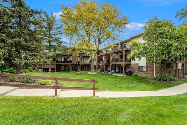 895 S Pontiac Trl Unit C206, Walled Lake, MI 48390 - view of property's community featuring a lawn