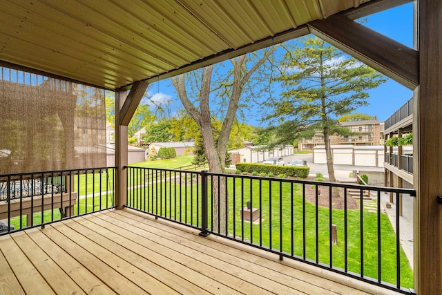 895 S Pontiac Trl Unit C206, Walled Lake, MI 48390 - wooden terrace with a residential view and a lawn
