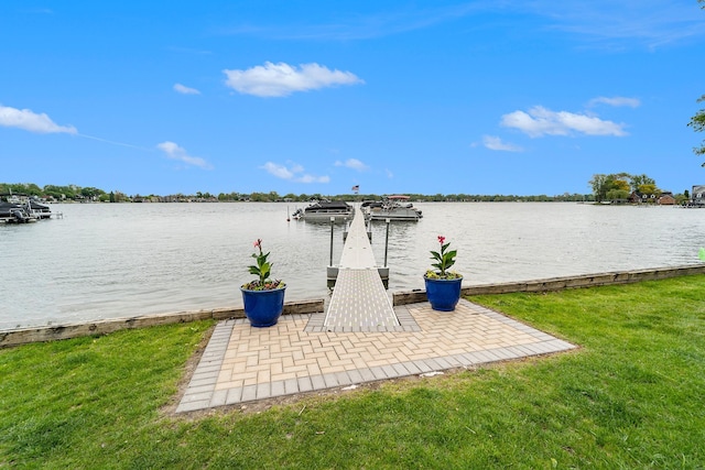 895 S Pontiac Trl Unit C206, Walled Lake, MI 48390 - dock area with a water view, a yard, and a patio area