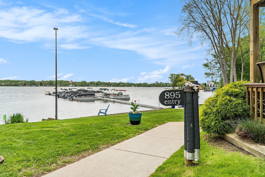 895 S Pontiac Trl Unit C206, Walled Lake, MI 48390 - water view featuring a dock