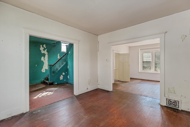 923 Calvert St, Detroit, MI 48202 - unfurnished room featuring hardwood / wood-style floors and plenty of natural light