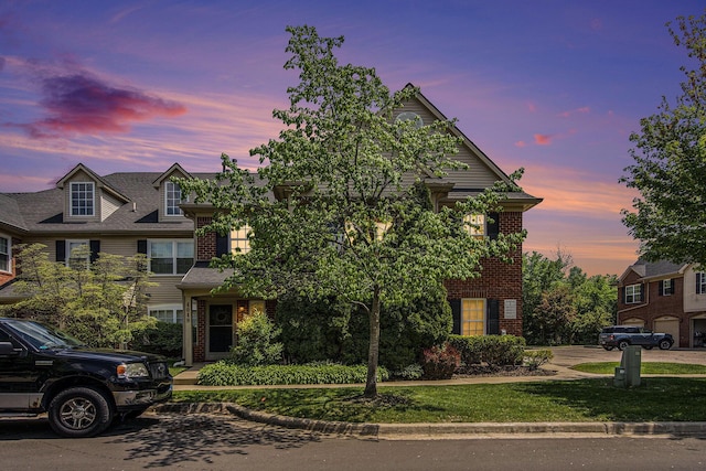 4049 Berkeley Ave Unit 25, Canton, MI 48188 - view of front facade with brick siding and a front yard