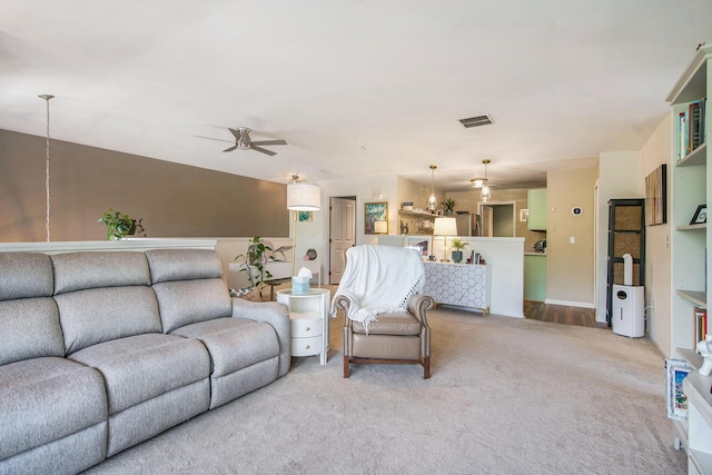 4049 Berkeley Ave Unit 25, Canton, MI 48188 - living area featuring ceiling fan, light colored carpet, and baseboards