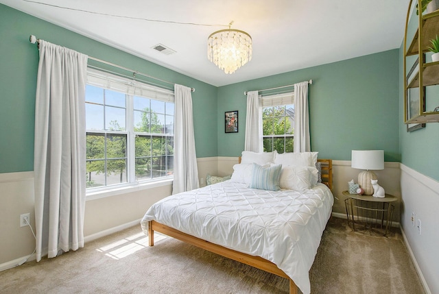 4049 Berkeley Ave Unit 25, Canton, MI 48188 - carpeted bedroom featuring a chandelier and baseboards