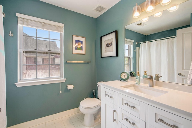 4049 Berkeley Ave Unit 25, Canton, MI 48188 - full bathroom with toilet, vanity, tile patterned floors, and a shower with shower curtain