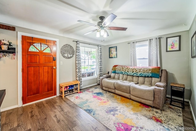 706 White Ave, Lincoln Park, MI 48146 - living area featuring wood finished floors, a ceiling fan, and baseboards