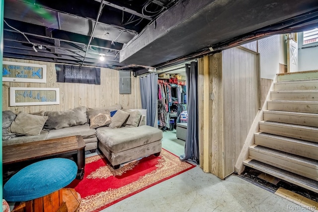 706 White Ave, Lincoln Park, MI 48146 - unfinished basement featuring wood walls, stairs, and electric panel
