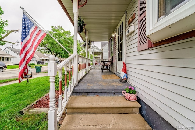 706 White Ave, Lincoln Park, MI 48146 - covered porch with a yard