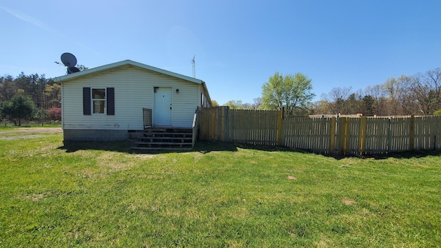 7939 W Moore Rd, Ravenna, MI 49451 - view of rear view of property