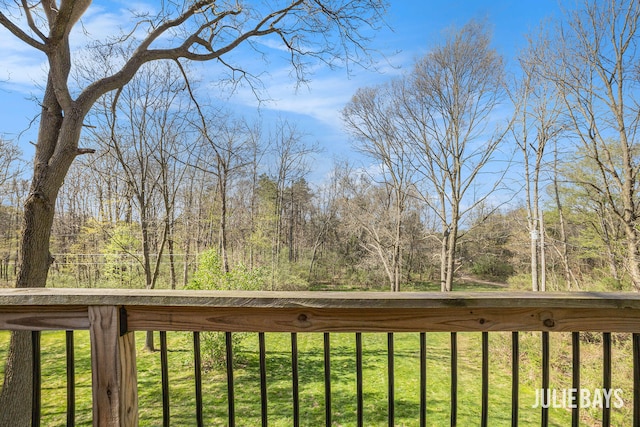 deck featuring a yard