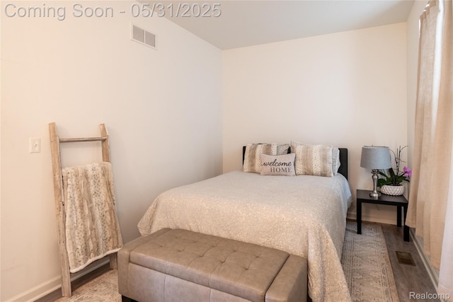 9480 White Tail Dr, Ypsilanti, MI 48197 - bedroom with wood finished floors and baseboards