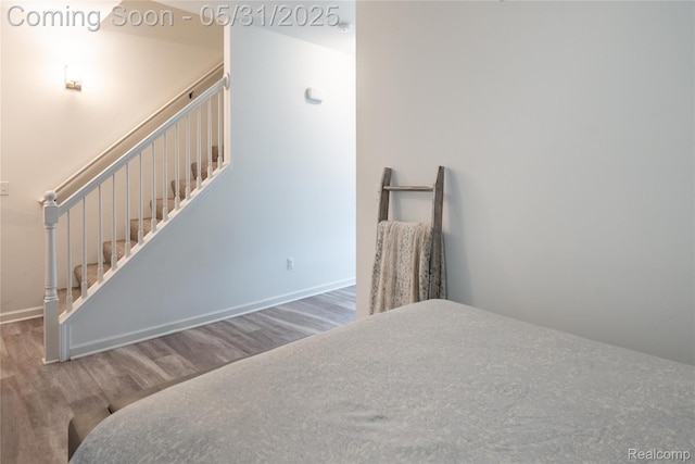 9480 White Tail Dr, Ypsilanti, MI 48197 - bedroom featuring wood finished floors and baseboards