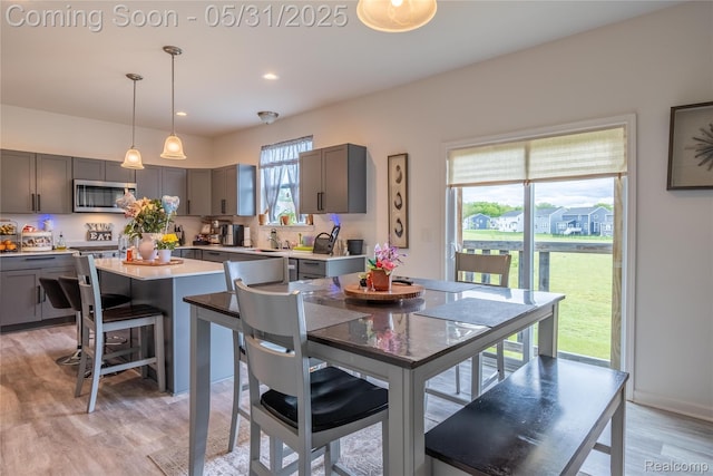 9480 White Tail Dr, Ypsilanti, MI 48197 - dining room with light wood finished floors and recessed lighting