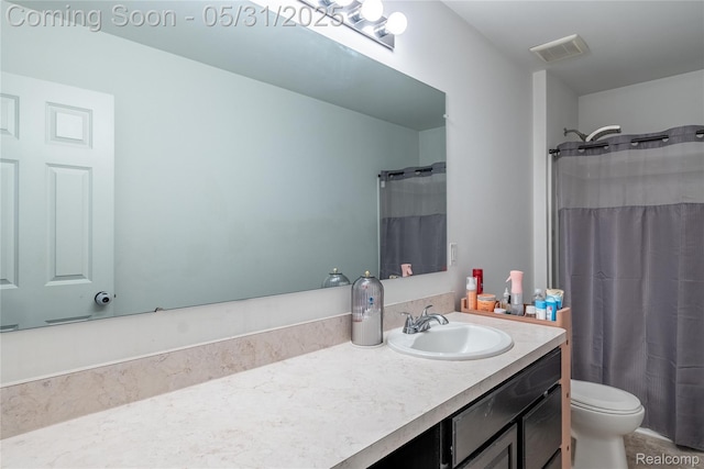 9480 White Tail Dr, Ypsilanti, MI 48197 - bathroom featuring vanity, toilet, and curtained shower