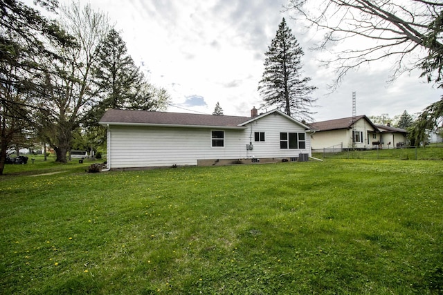 rear view of house with a chimney