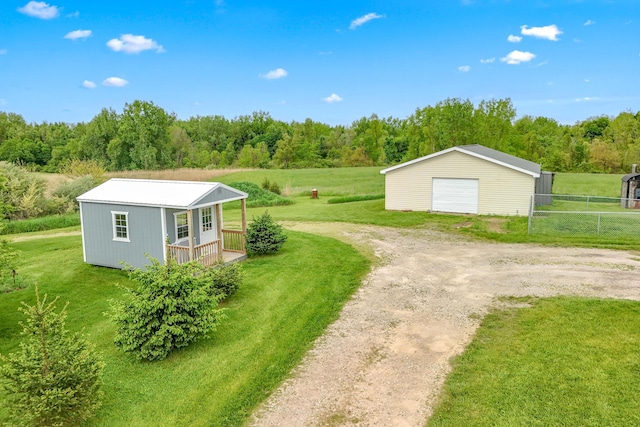 10060 Pioneer Rd, Hillsdale, MI 49242 - view of outdoor structure featuring driveway