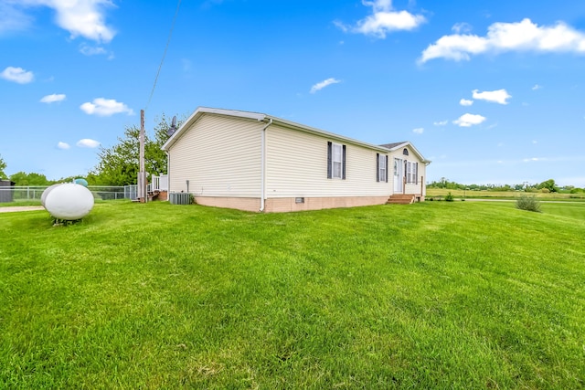 10060 Pioneer Rd, Hillsdale, MI 49242 - view of side of home featuring entry steps and central AC unit