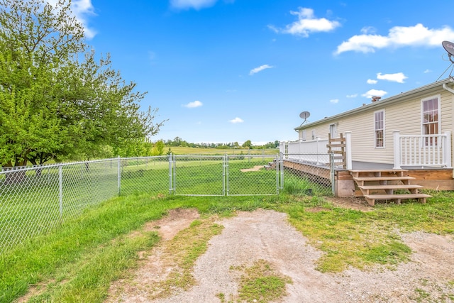 10060 Pioneer Rd, Hillsdale, MI 49242 - view of yard with a deck and a gate