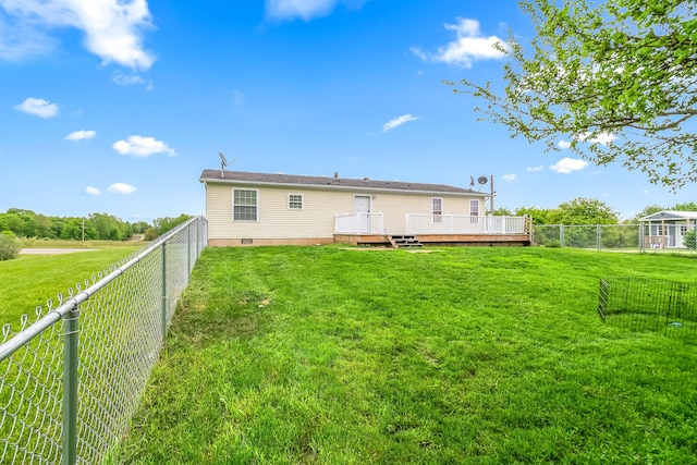 10060 Pioneer Rd, Hillsdale, MI 49242 - rear view of house with a wooden deck and crawl space