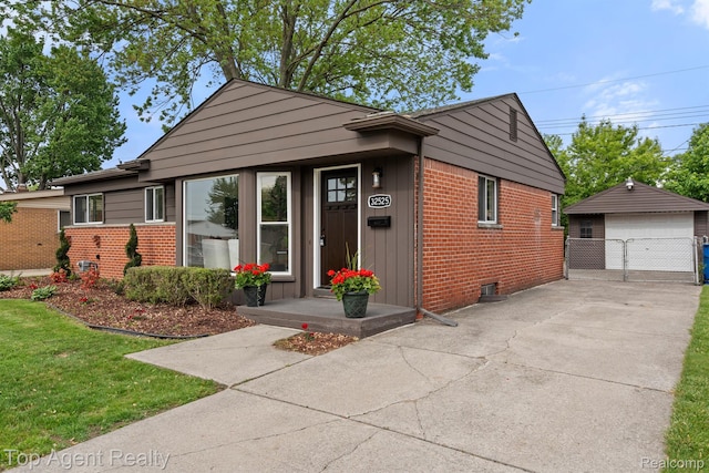 32525 Holden Dr, Warren, MI 48092 - bungalow featuring brick siding, a garage, an outbuilding, a front yard, and board and batten siding