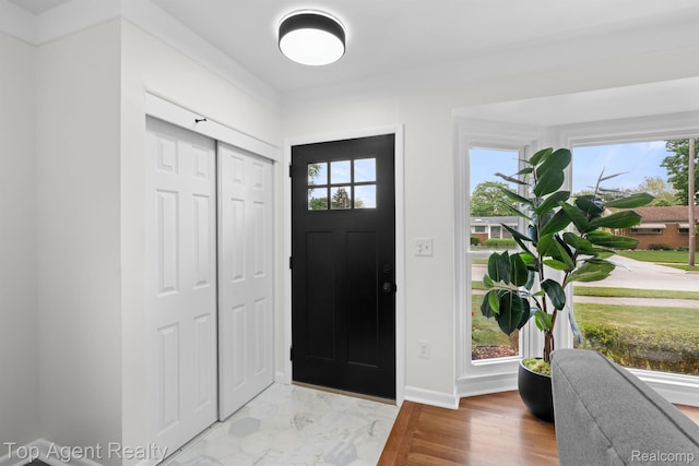 32525 Holden Dr, Warren, MI 48092 - foyer entrance with plenty of natural light and baseboards