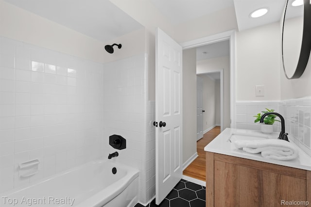 32525 Holden Dr, Warren, MI 48092 - full bath with tub / shower combination, tile patterned floors, vanity, and tile walls