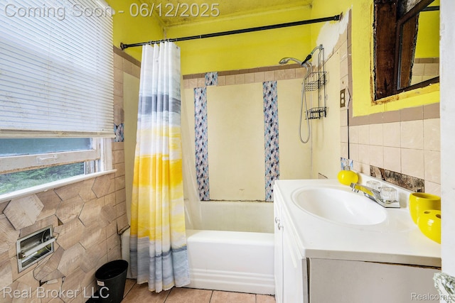 15036 Blackstone St, Detroit, MI 48223 - bathroom featuring shower / bathtub combination with curtain, tile walls, vanity, and tile patterned floors