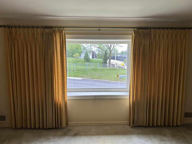 805 Capen St NE, Grand Rapids, MI 49505 - spare room featuring carpet flooring and baseboards