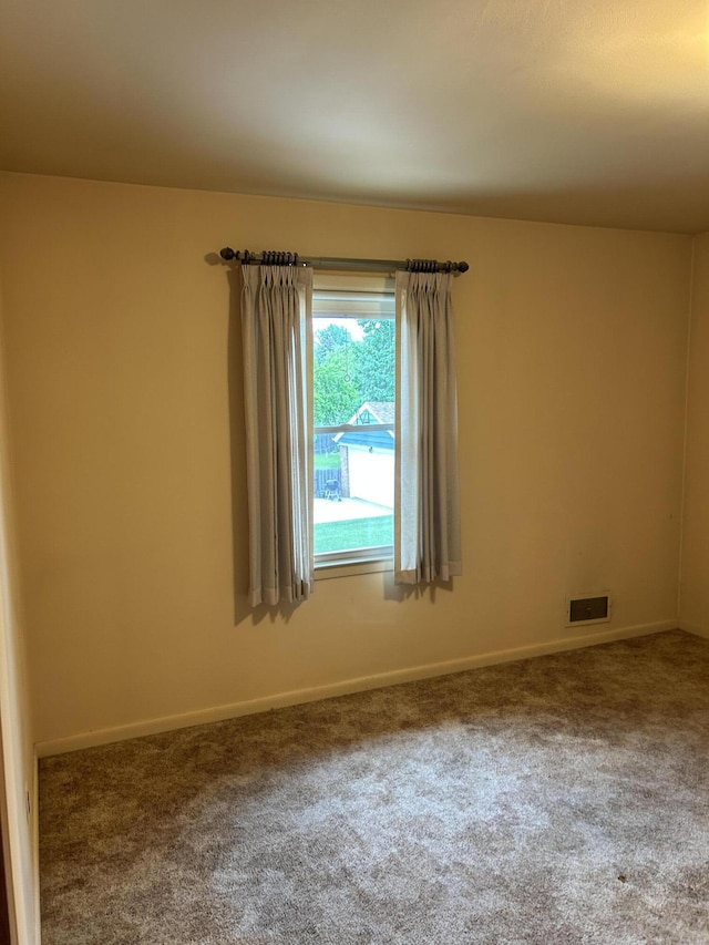 805 Capen St NE, Grand Rapids, MI 49505 - empty room with carpet and baseboards