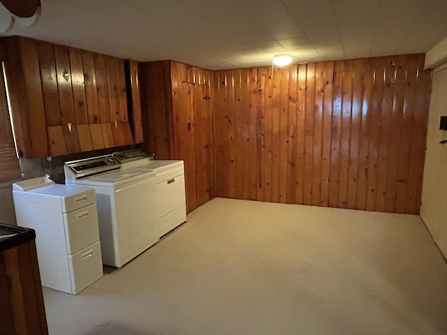 805 Capen St NE, Grand Rapids, MI 49505 - laundry area with independent washer and dryer, wooden walls, and light colored carpet