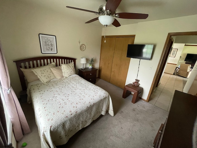 15091 Sebastian Ct, Shelby Twp, MI 48315 - bedroom with a closet, light colored carpet, and a ceiling fan