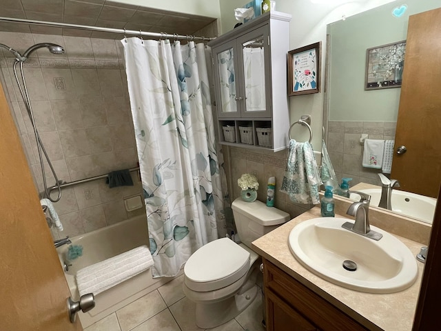 15091 Sebastian Ct, Shelby Twp, MI 48315 - full bathroom with shower / bath combo with shower curtain, tile patterned flooring, vanity, toilet, and tile walls