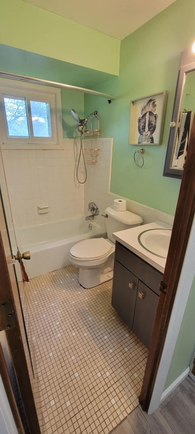 5374 36th Ave Unit 38, Hudsonville, MI 49426 - bathroom with toilet, shower / tub combination, vanity, and tile patterned floors