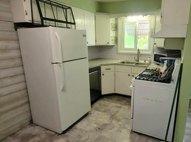 5374 36th Ave Unit 38, Hudsonville, MI 49426 - kitchen with white appliances, a sink, decorative backsplash, light countertops, and white cabinetry